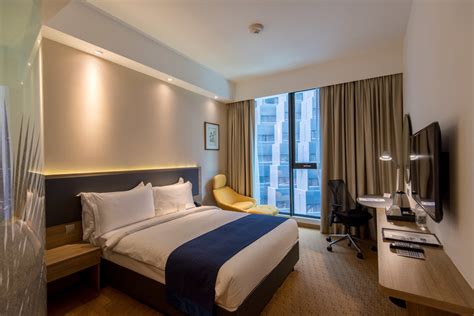 The room is small but clean and very friendly, helpful staff. Hotel Review: Holiday Inn Express Singapore Orchard Road ...