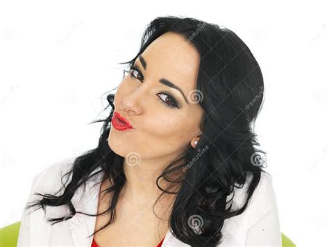 Portrait Of A Cheeky Young Hispanic Woman Pulling Silly Faces Stock Image Image Of Head