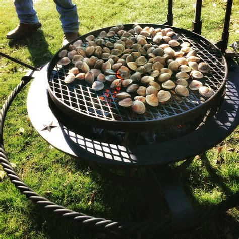 Using a level, make sure the bricks are relatively even all the way around. Smoked clams on our 30 Gallon Fire Kettle over a wood fire ...