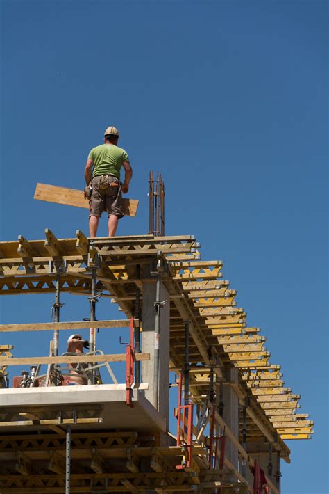 Workers At A Construction Site Free Stock Photo Libreshot