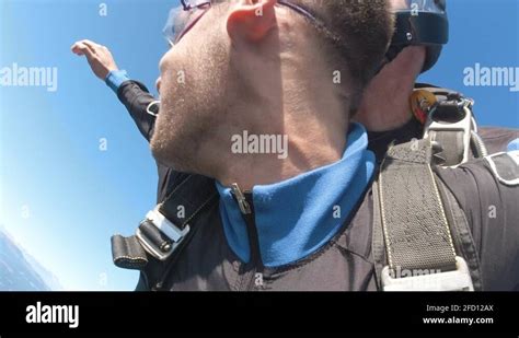 footage of two skydiver falling the free fall and their parachute opens stock video footage alamy