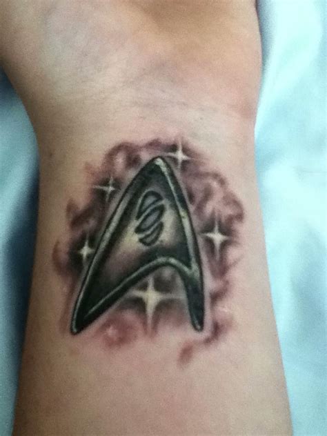 Part of my bloodborne sleeve. Shinning Star Trek Logo Tattoo On Wrist