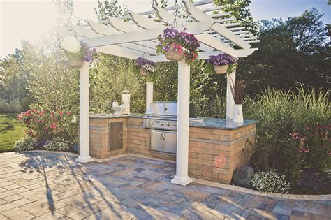 Upgrade your outdoor space with an outdoor kitchen. Outdoor Kitchen Island with grill, sink & refrigerator. An ...