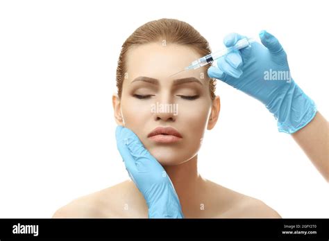 Young Woman Having Cosmetic Injection On White Background Plastic