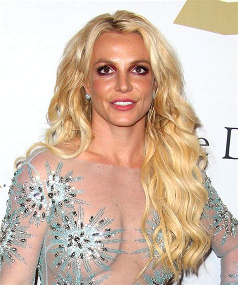 Behold, brit's life in hairstyles. Britney Spears Long Curly Casual Hairstyle - Light Golden ...