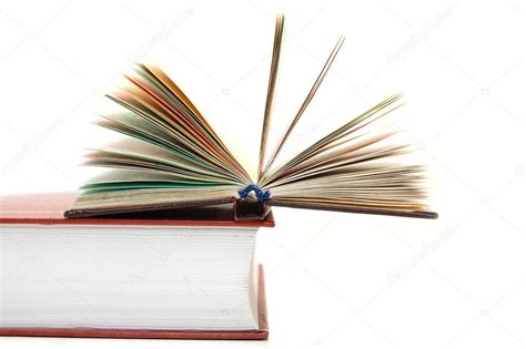 Small Open Book Lays On Big Textbook — Stock Photo © Voronin 76 2638058