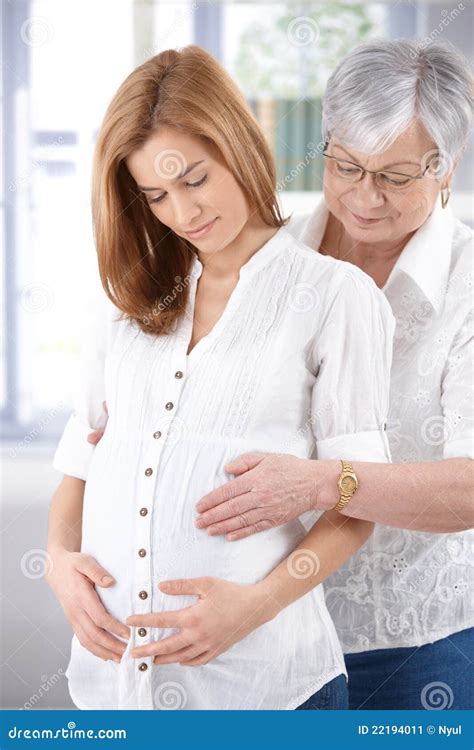 Attractive Pregnant Woman And Senior Mother Stock Image Image Of Cosy