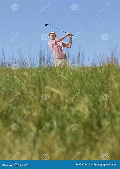Golfer Swinging A Golf Club Stock Image Image Of Outdoors Challenge