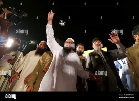 Hafiz Saeed Center Head Of The Pakistani Religious Party Jamaat Ud Dawa Waves To Supporters