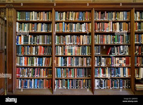 Wooden Shelving With Library Books Stock Photo Alamy