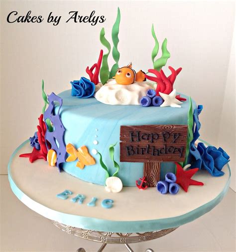 I like the idea of a fish themed birthday party. Nemo Birthday Cake - CakeCentral.com