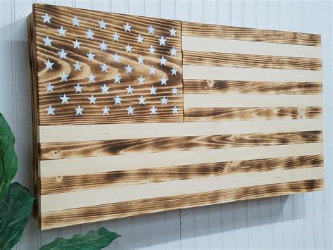 Watch short videos about #concealedguncabinet on tiktok. Burnt Charred American flag wooden concealment furniture ...