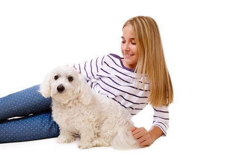 Happy Lovely Girl Laying On The Floor With Maltese Dogisolated Stock