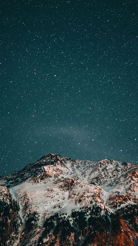 Snow Covered Mountain Under Starry Night Iphone 8 Wallpapers Free Download