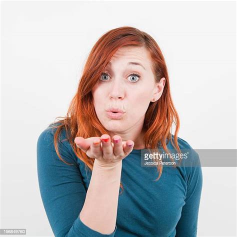 Redhead Blowing Kiss Photos And Premium High Res Pictures Getty Images