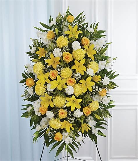 When you need funeral or sympathy flowers, pick avas flowers as your online floral shop. Yellow & White Sympathy Standing Spray at From You Flowers