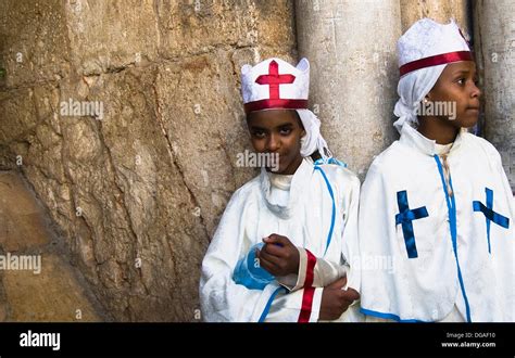 Eritrean Orthodox Nuns Standing By The Main Gate Of The Church Of The