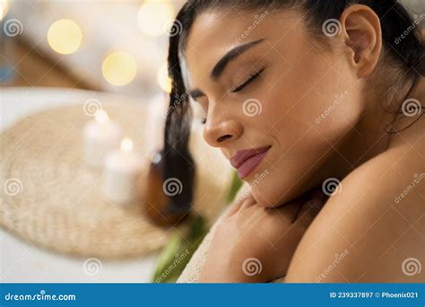 Closeup Pretty Girl Laying On Massage Table Candles In Background Stock
