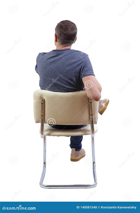 Back View Of A Man Sitting On A Chair Stock Photo Image Of Learning