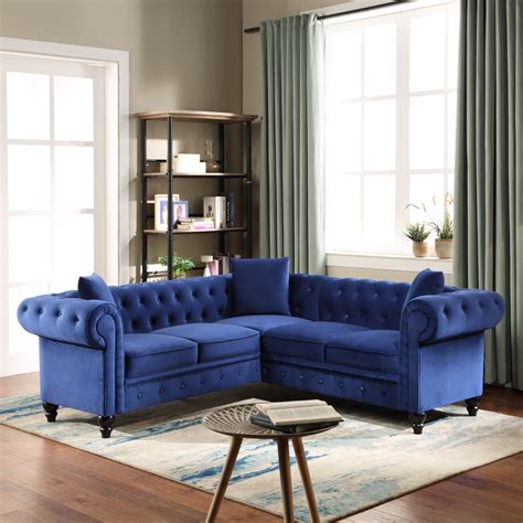 Velvet Tufted Sofa With Chaise Blue And Orange Living Room Features A