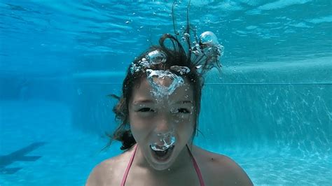Swimming Underwater In Pool
