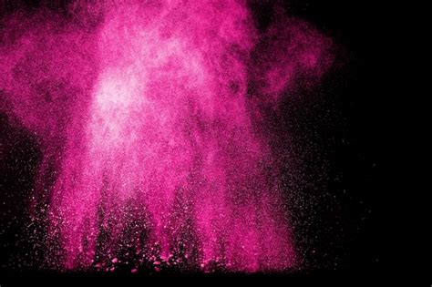 Premium Photo Pink Powder Explosion On Black Background