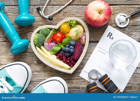 Healthy Lifestyle Concept With Diet Fitness And Medicine Stock Photo
