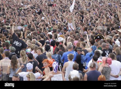 Visitors Joins During So Called Woodstock Stop Festival In The Polish Town Of Kuestrin On July