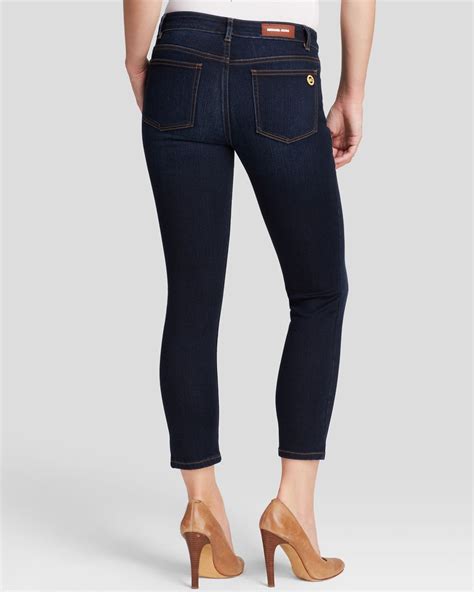lyst michael michael kors cropped skinny jeans in midnight in blue