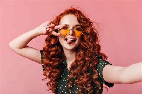 Free Photo Positive Ginger Girl Taking Selfie With Peace Sign Pretty Red Haired Lady Making