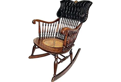 A Spindle Back American Rocking Chair Circa 1890 With Tufted Leather Seat Back Reinforced