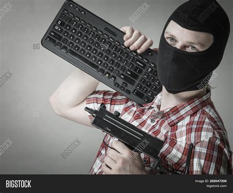 Computer hacker balaclava stock photo edit now 163983167. Gun Shutterstock Hacker