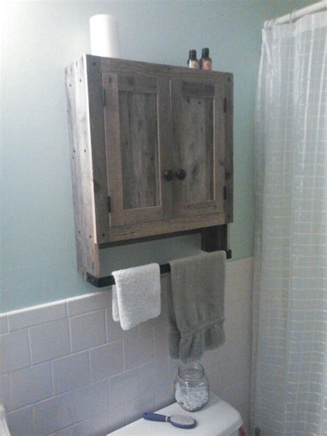 You can see how the cabinet is now straight against the wall without having to cut the molding out. Reclaimed pallet wood bathroom wall cabinet (With images ...