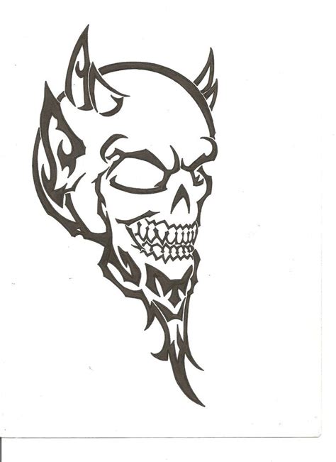 Fine Black Ink Tribal Devil Skull Tattoo Design By The Fuzzy Dude