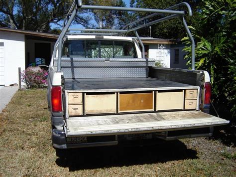 This build relies on homemade drawer slides, making it affordable and durable at the . Creative DIY Truck Storage Solution! | Creative DIY SUV ...