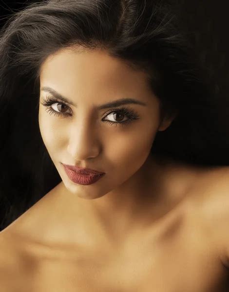 Beautiful Face Of Young Exotic Woman Stock Photo By ©avfc 25957601