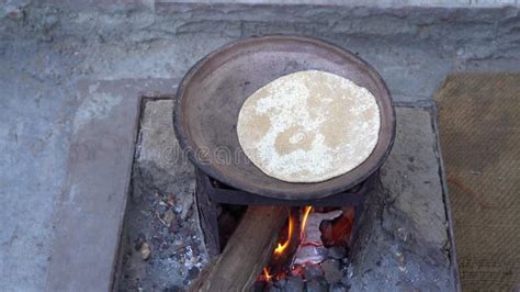Making Roti Chapati Naan Paratha By Spreading The Dough With Hand Stock