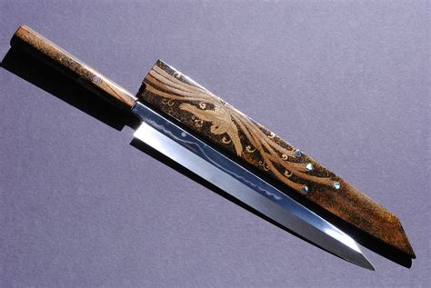 Japanese knife brands are very sensitive about the handles of their knives. Yoshihiro Mizuyaki Honyaki Mirror Finished Mt.Fuji with ...