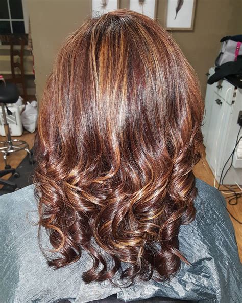 Beach blonde highlights are sprinkled lightly throughout the top portion of the hair in this easy hairstyle. 13 Beautiful Brown Hair with Blonde Highlights and Lowlights