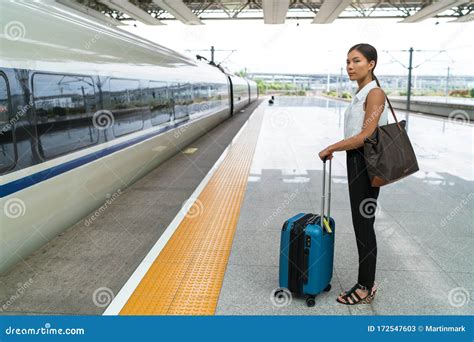 Asian Traveler Woman Waiting For Travel On Railway Platform Businesswoman Standing With