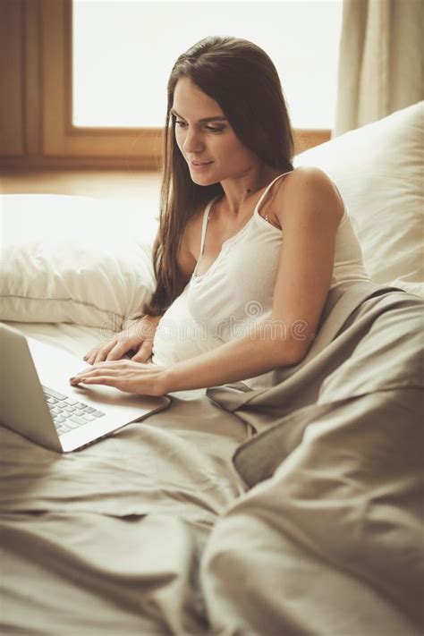 Beautiful Brunette Lying On Bed At Home Stock Image Image Of Breast