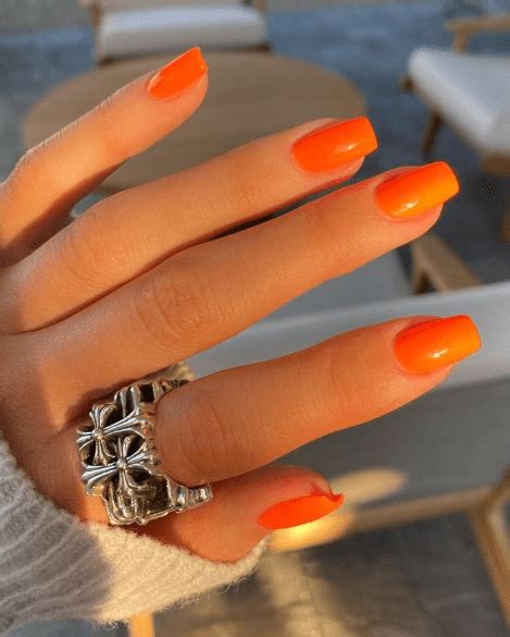 50 kylie jenner nails inspired to try this season these trendy nails ideas would gain you amazing compliments. kylie jenner nails for summer in orange - Blush & Pearls