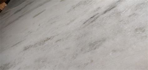 Quartzite naturelle calacatta superwhite disponible à la marbrerie des yvelines, qui travaille le schiste, la nacre et le granit. Calacatta Super White Quartzite - SWGG Inventory