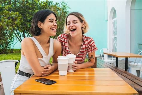 Premium Photo Loving Lesbian Couple Having A Date At Coffee Shop