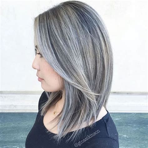 black hair with gray balayage a mix of light and dark grays to add a new dimension to the