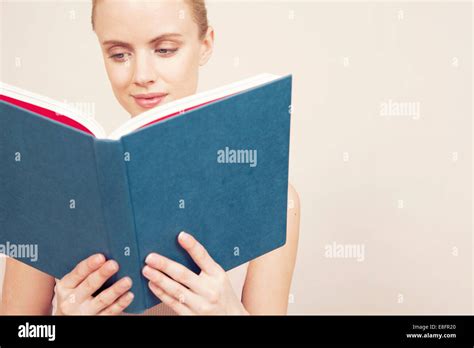 Young Woman Reading A Book Stock Photo Alamy