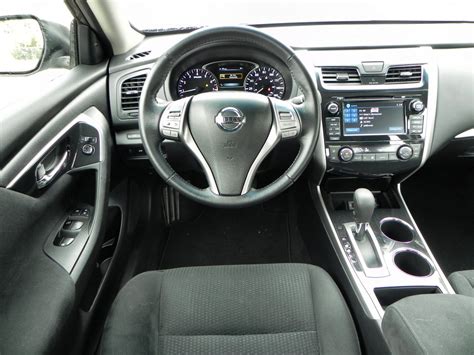 The build looks clean and stream lined, the interior is spacious and comfortable. 2014 Nissan Altima interior review | Aaron on Autos