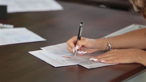 Woman Signing Documents Stock Video Motion Array