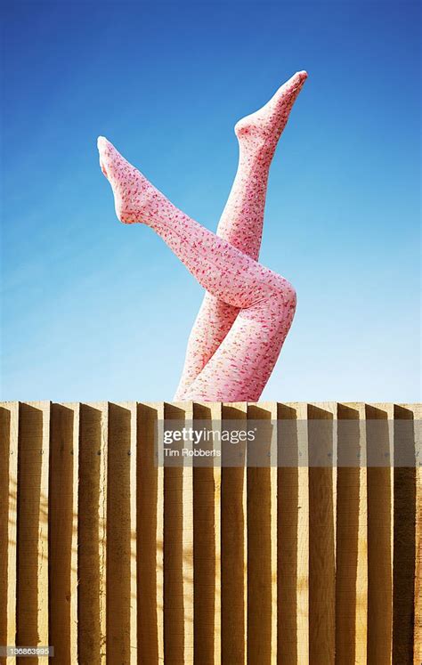 Young Woman In Pink Tights With Legs In The Air Photo Getty Images