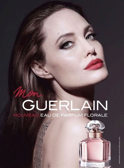 A Woman Is Posing With Her Arm Around Her Neck And The Words Guerlain